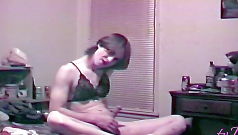 Brunette shows her legs and her pussy in sexy lingerie